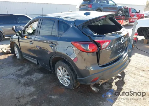 2015 Mazda Cx-5 Touring z USA, uszkodzony, nr VIN JM3KE2CY9F0527901